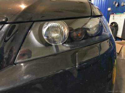 Левая фара Honda после покраски отражателя