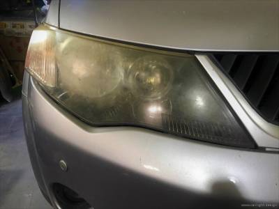 Мутное стекло фары Mitsubishi Outlander XL