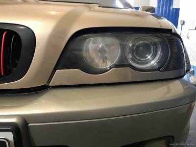 Левая фара до замены линз BMW e46