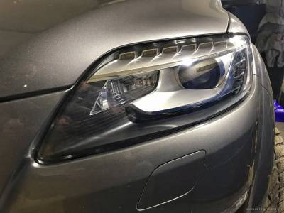 Новое стекло на фаре Audi Q7