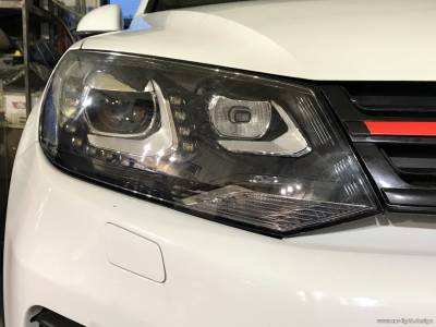 Установка отремонтированной фары на автомобиль Volkswagen Touareg