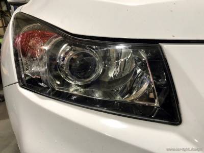Установленная билинза в галогенную фару Chevrolet Cruze