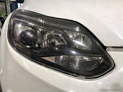 Замененные линзы в фарах Ford Focus
