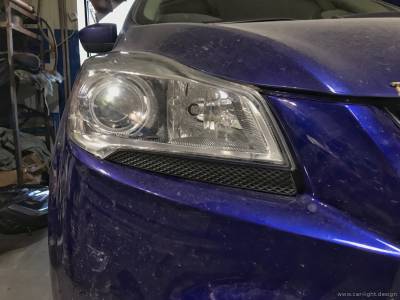 Установка биксеноновой линзы в фару Ford Kuga