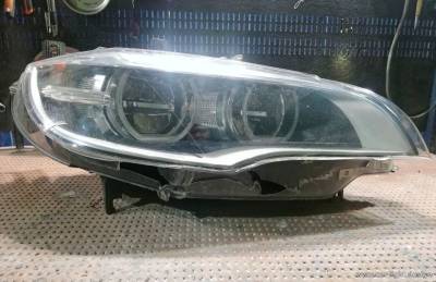 Разбитое стекло фары BMW X6 e71 Full LED