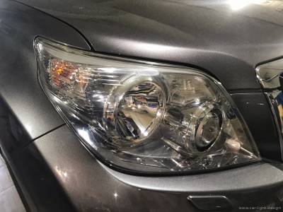 Стекло фары Toyota Prado после полировки