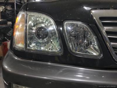 Разбалансированный по свету галогенный модуль фары Lexus LX 470