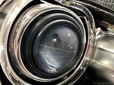 Грязная линза фары BMW X5 e70