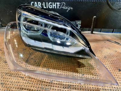 Подготовка к установке нового стекла на фару BMW